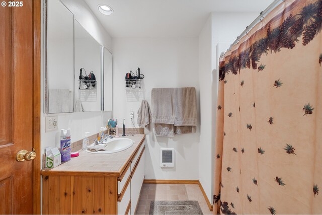 full bath with vanity, tile patterned flooring, heating unit, baseboards, and recessed lighting