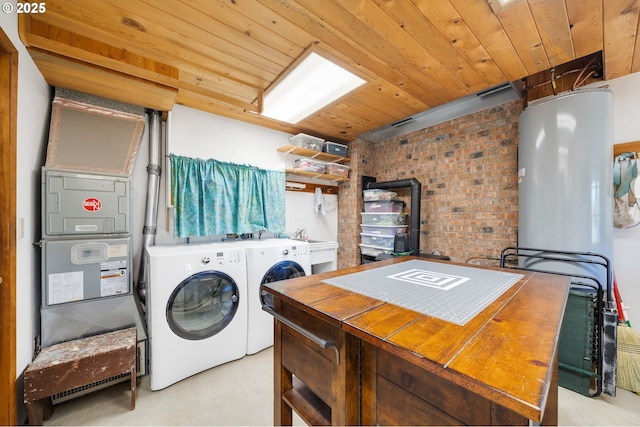 laundry room with laundry area, washer and dryer, brick wall, and wood ceiling