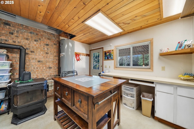 office space featuring brick wall, light colored carpet, wooden ceiling, and a wood stove