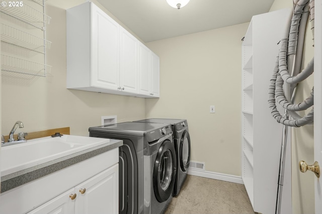 7307 SW Capitol Hwy, Portland, OR 97219 - washroom featuring washing machine and dryer and cabinet space