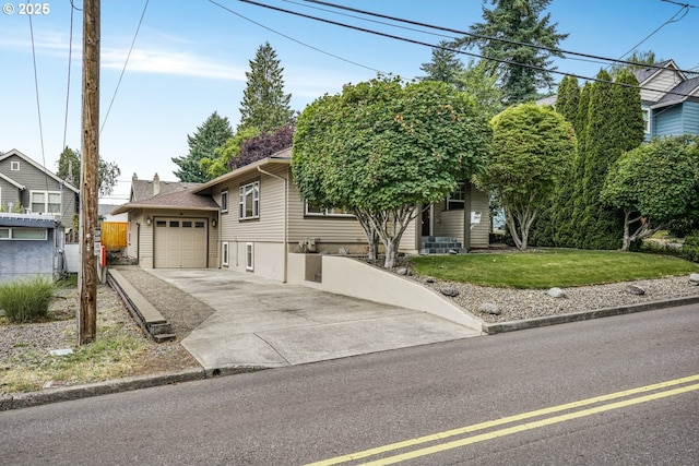 7307 SW Capitol Hwy, Portland, OR 97219 - view of front of house with driveway and a front yard