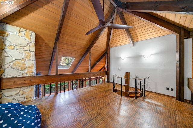 additional living space featuring vaulted ceiling with beams, hardwood / wood-style floors, wooden ceiling, and ceiling fan