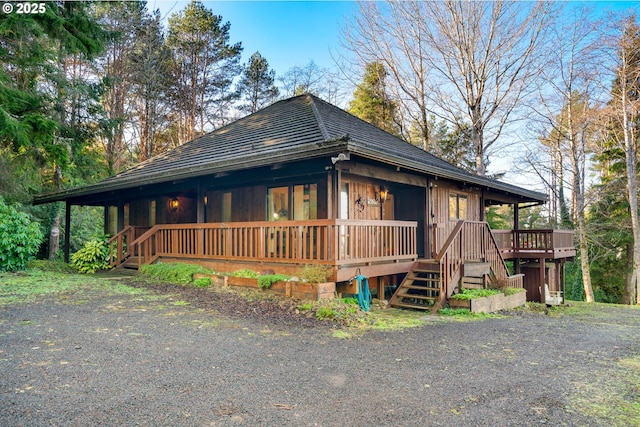 view of front of home with a deck