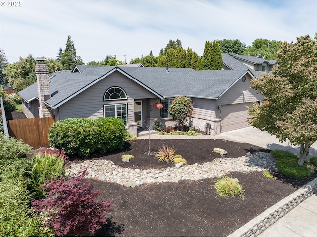 870 Sheraton Dr, Eugene, OR 97401 - view of front of house featuring driveway, an attached garage, a chimney, and a shingled roof