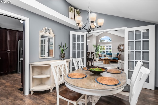 870 Sheraton Dr, Eugene, OR 97401 - dining space with lofted ceiling, a chandelier, and dark wood-style flooring