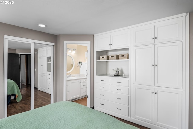870 Sheraton Dr, Eugene, OR 97401 - bedroom featuring dark wood-style floors, recessed lighting, and connected bathroom