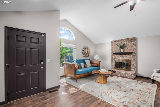 870 Sheraton Dr, Eugene, OR 97401 - living room with lofted ceiling, ceiling fan, wood finished floors, and a fireplace
