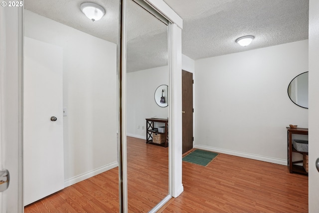 5585 E Evergreen Blvd, Vancouver, WA 98661 - corridor with light wood-type flooring and a textured ceiling