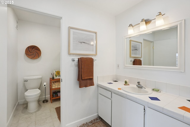 5585 E Evergreen Blvd, Vancouver, WA 98661 - bathroom with vanity and marble look tiles