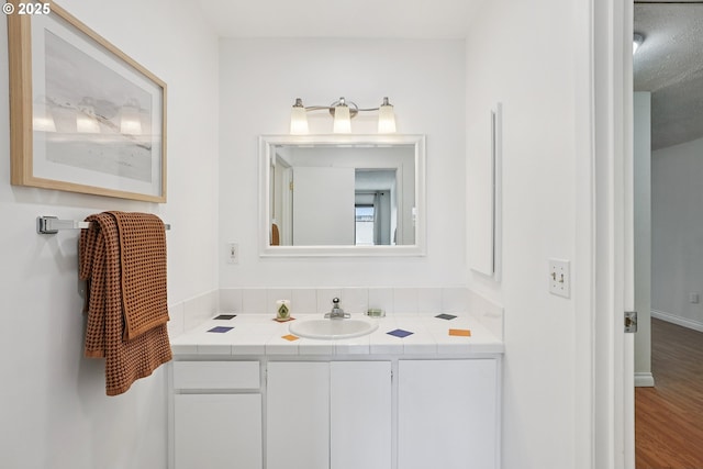 5585 E Evergreen Blvd, Vancouver, WA 98661 - bathroom featuring vanity and wood finished floors