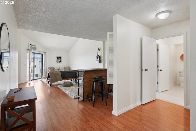 5585 E Evergreen Blvd, Vancouver, WA 98661 - office with wood finished floors, a textured ceiling, a dry bar, and lofted ceiling