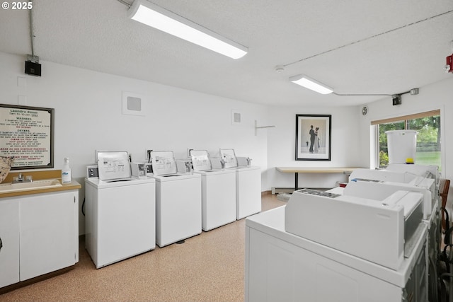 5585 E Evergreen Blvd, Vancouver, WA 98661 - community laundry with independent washer and dryer and a textured ceiling