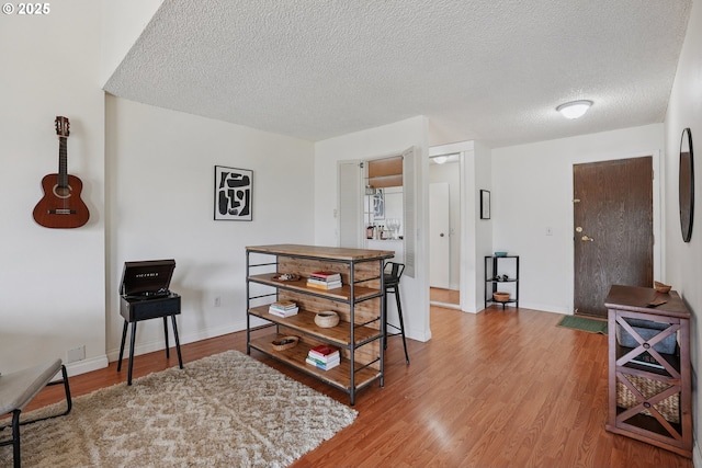 5585 E Evergreen Blvd, Vancouver, WA 98661 - living area featuring wood finished floors and a textured ceiling