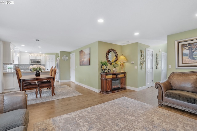 11619 NE 102nd Cir, Vancouver, WA 98662 - living area with baseboards, recessed lighting, and light wood-style flooring
