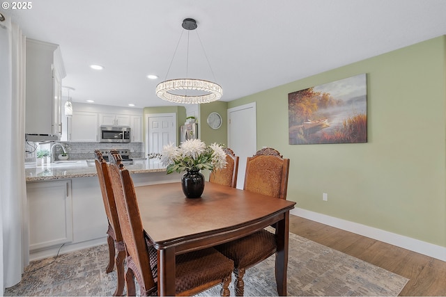 11619 NE 102nd Cir, Vancouver, WA 98662 - dining room with light wood-style floors, recessed lighting, and baseboards
