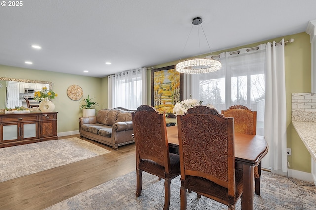11619 NE 102nd Cir, Vancouver, WA 98662 - dining room featuring baseboards, recessed lighting, and wood finished floors
