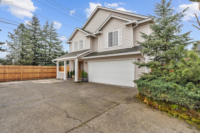 11619 NE 102nd Cir, Vancouver, WA 98662 - traditional-style house featuring fence, concrete driveway, and a garage