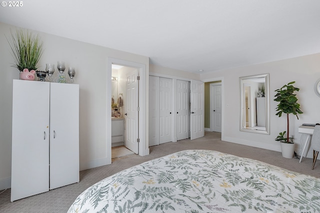 11619 NE 102nd Cir, Vancouver, WA 98662 - carpeted bedroom with baseboards and ensuite bath