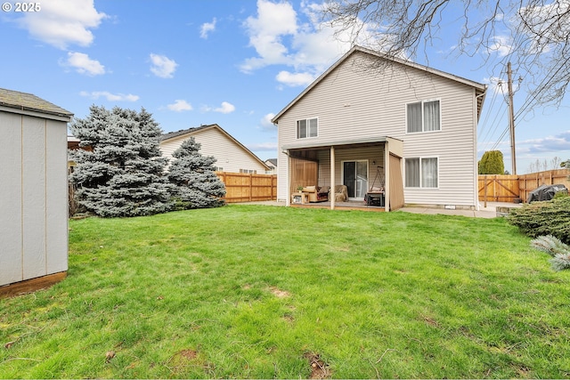 11619 NE 102nd Cir, Vancouver, WA 98662 - rear view of house featuring a fenced backyard, a yard, and a patio area