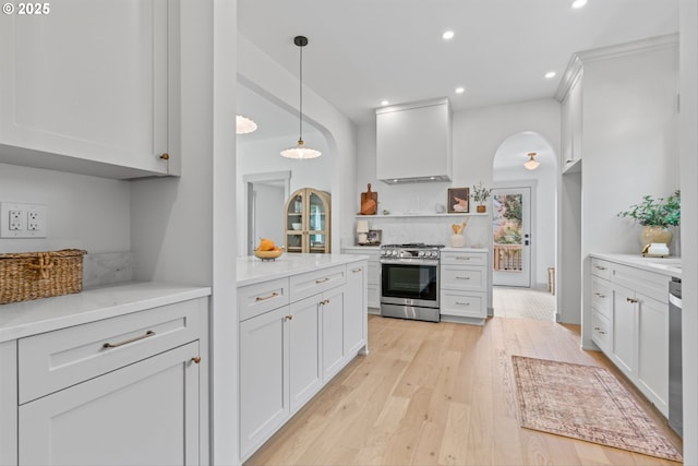 625 NE 69th Ave, Portland, OR 97213 - kitchen featuring stainless steel appliances, custom range hood, light wood-style floors, recessed lighting, and pendant lighting
