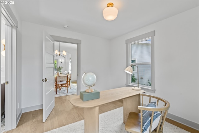 625 NE 69th Ave, Portland, OR 97213 - office space with light wood-style flooring, baseboards, healthy amount of natural light, and a chandelier