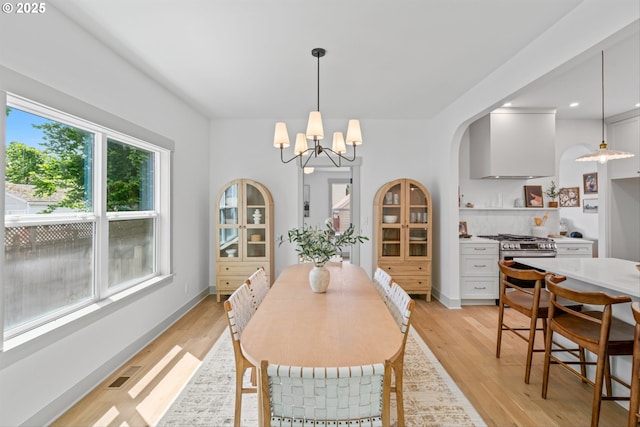 625 NE 69th Ave, Portland, OR 97213 - dining area with light wood-style flooring, a chandelier, and recessed lighting