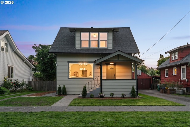 625 NE 69th Ave, Portland, OR 97213 - view of front of property featuring a shingled roof and an outbuilding