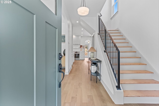 625 NE 69th Ave, Portland, OR 97213 - foyer with stairs, light wood-style floors, and recessed lighting