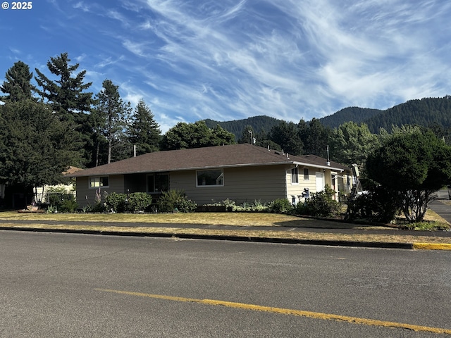 47858 W 1st St, Oakridge, OR 97463 - view of front of house with a mountain view