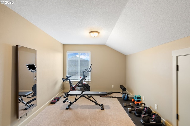 workout room featuring carpet flooring, a textured ceiling, and vaulted ceiling