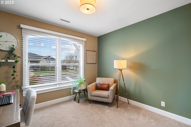 living area with carpet floors