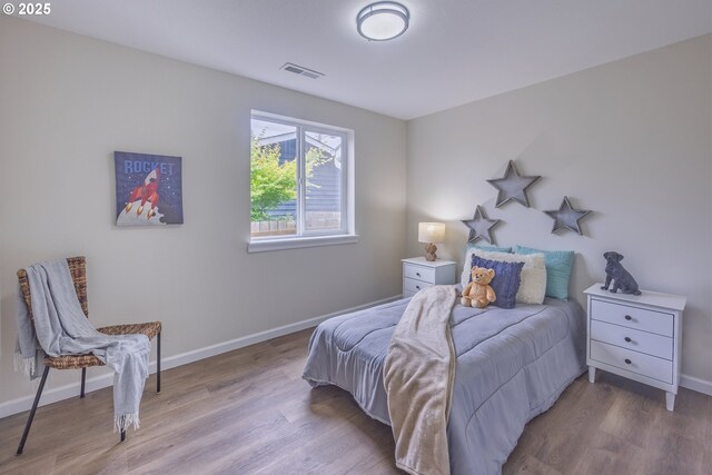 1109 SW 15th St, Lincoln City, OR 97367 - bedroom featuring wood finished floors