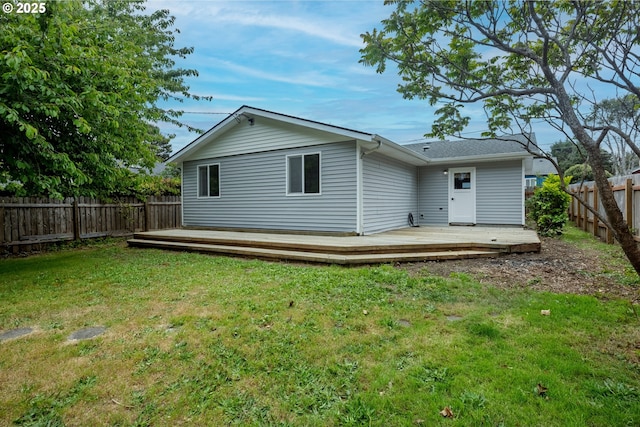 1109 SW 15th St, Lincoln City, OR 97367 - back of house featuring a fenced backyard and a wooden deck