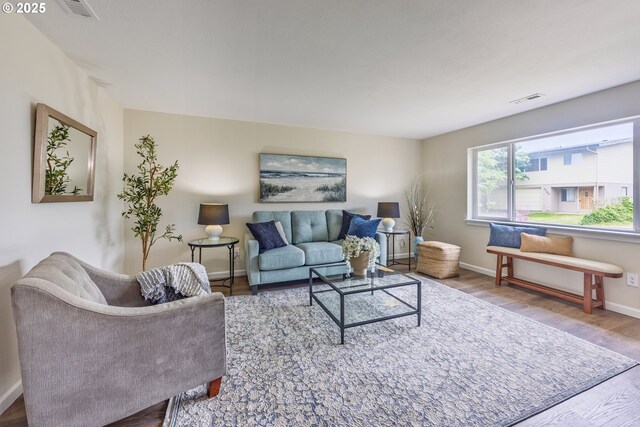 1109 SW 15th St, Lincoln City, OR 97367 - living area featuring wood finished floors and baseboards