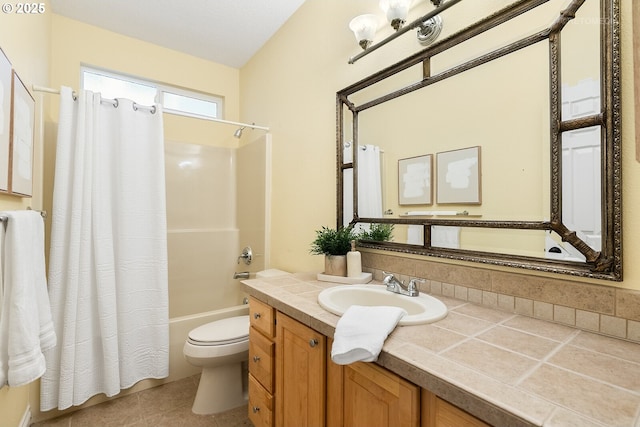 full bath featuring vanity, toilet, shower / bath combo with shower curtain, and tile patterned flooring