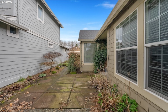 view of home's exterior with a patio area