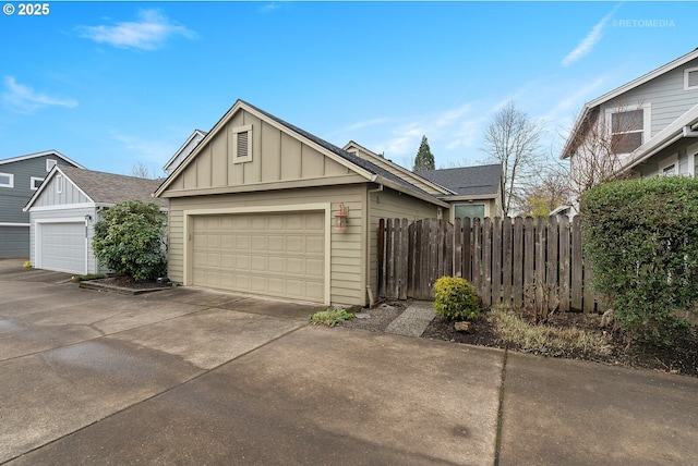 garage with fence