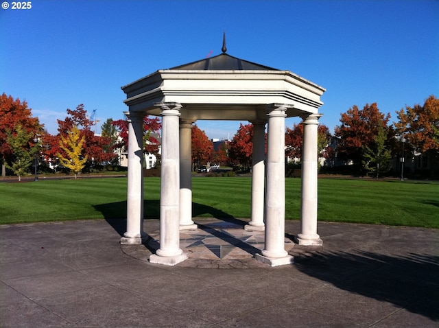 view of community featuring a gazebo and a lawn