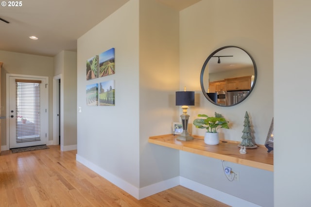 1202 SE Yarrow Ave, Madras, OR 97741 - corridor with light wood-type flooring and recessed lighting