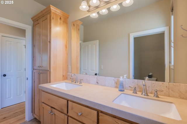 1202 SE Yarrow Ave, Madras, OR 97741 - bathroom featuring double vanity and wood finished floors