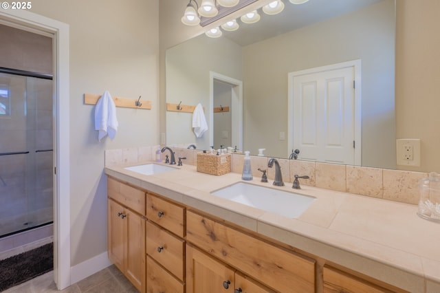 1202 SE Yarrow Ave, Madras, OR 97741 - full bath with double vanity, tile patterned flooring, and a shower with door