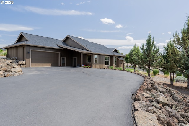 1202 SE Yarrow Ave, Madras, OR 97741 - ranch-style house featuring board and batten siding, driveway, a garage, and a shingled roof
