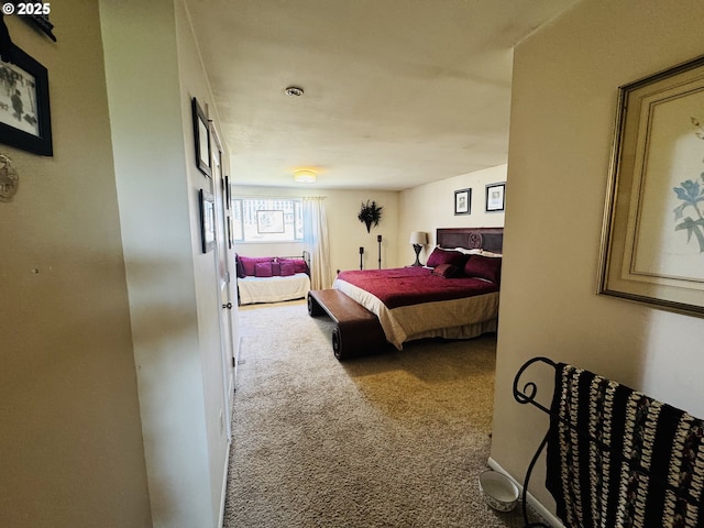 bedroom featuring carpet