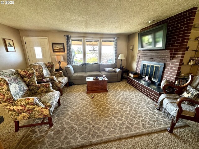 carpeted living area featuring a textured ceiling and a fireplace