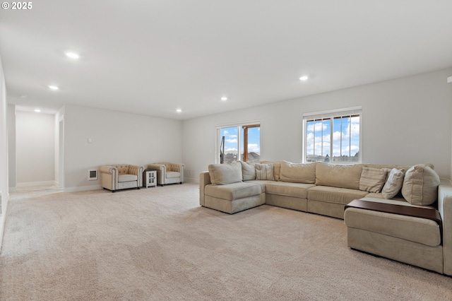 living room featuring light carpet