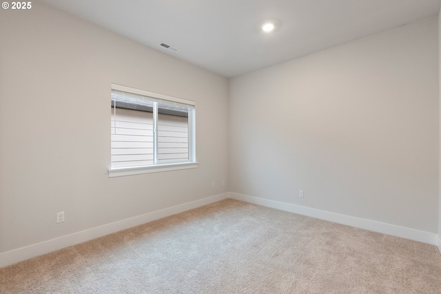 view of carpeted spare room