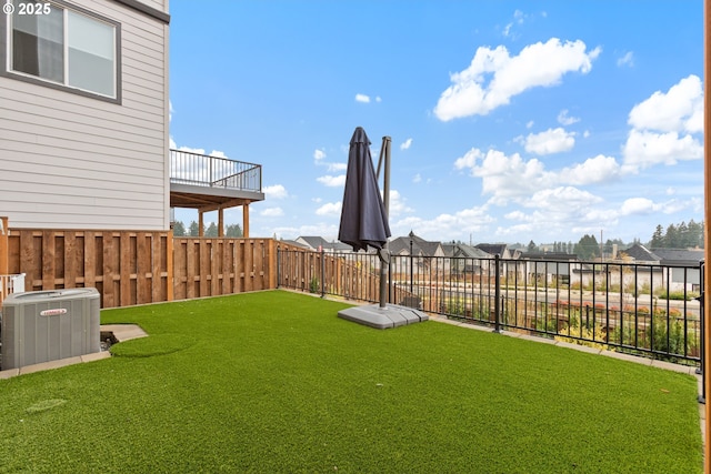 view of yard featuring central AC