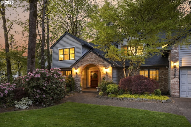 2757 Rivendell Rd, Lake Oswego, OR 97034 - tudor home featuring a yard and brick siding