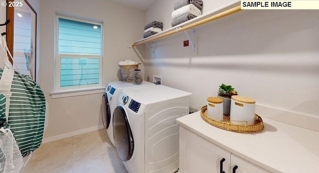 clothes washing area featuring washer and clothes dryer