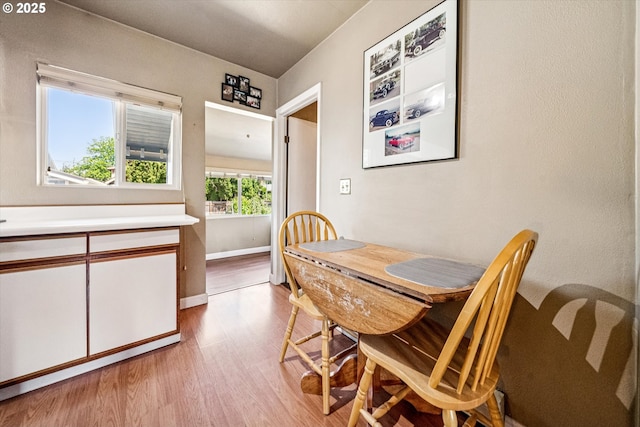 5246 SE 65th Ave, Portland, OR 97206 - dining room featuring light wood-type flooring and baseboards